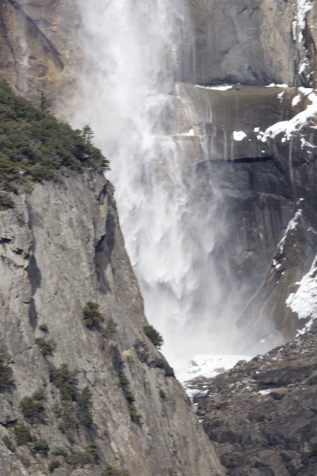 Powerful Waterfall Cascading Down Yosemite's Granite Cliffs