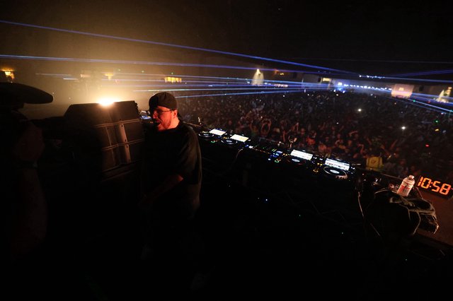 DJ Commanding Massive Crowd at Wobbleland Festival