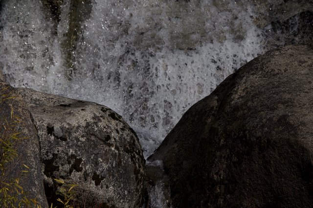 Rushing Water Between Ancient Granite Boulders in Yosemite