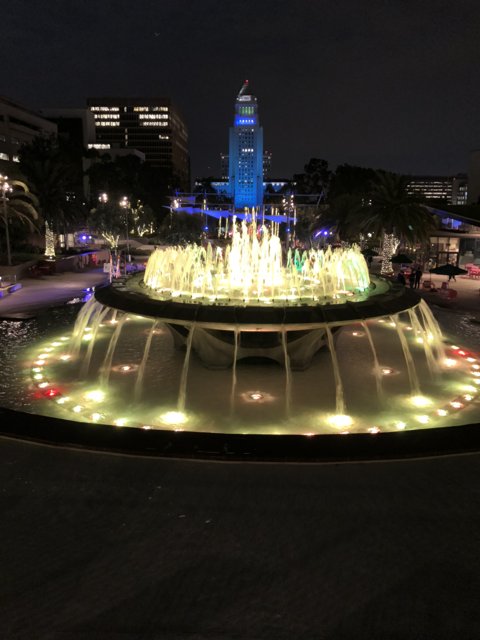Illuminated Fountain in the Urban Metropolis