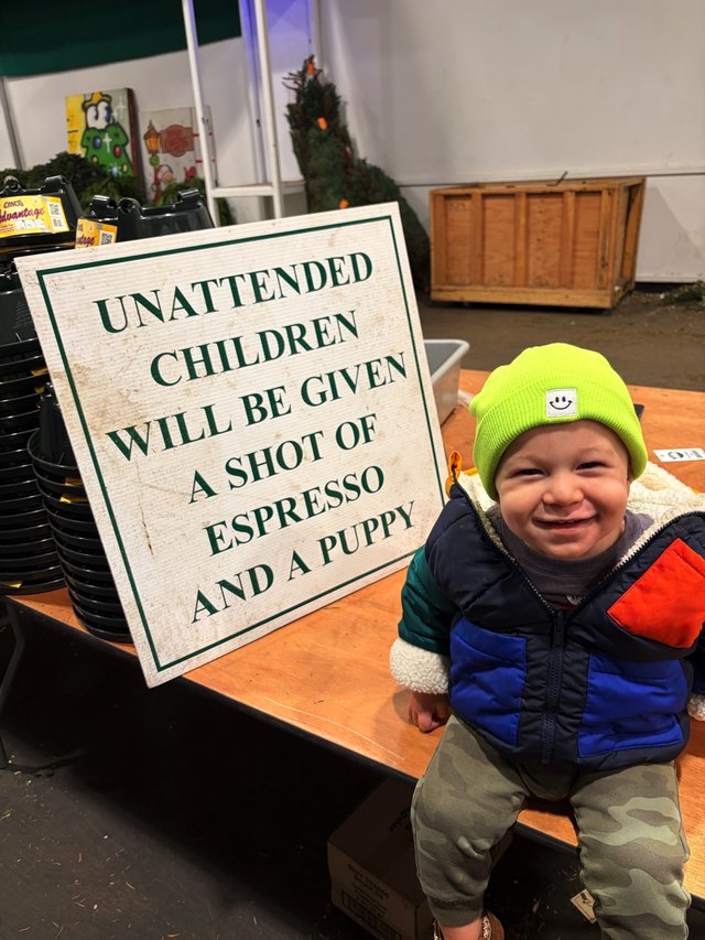 Adorable Toddler at Christmas Market Espresso Stand