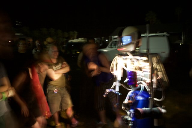 Blue-Lit Robot Joins Coachella Night Sky