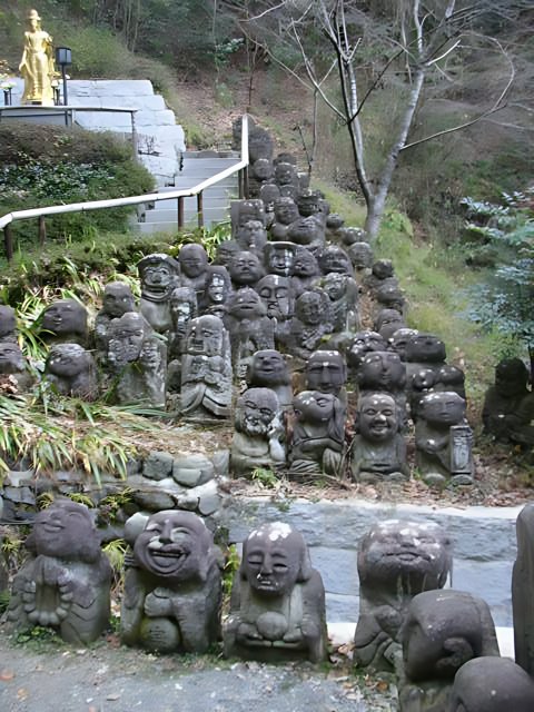 Stone Statues Standing Tall in a Kyoto Park