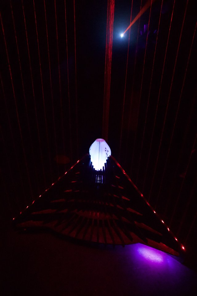 Illuminated Skull Installation with Red Laser Light Patterns