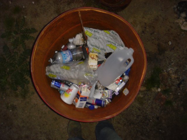 Brown Bucket of Discarded Items