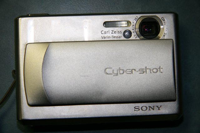 Sony Silver Digital Camera with a Camera Lens
