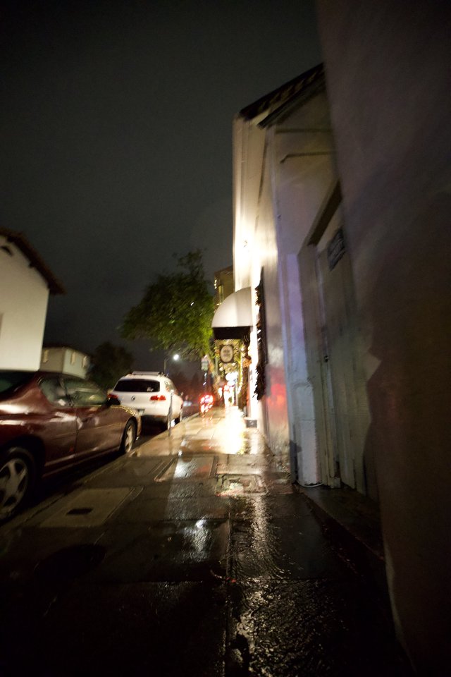 Rainy Night on a Narrow Urban Street