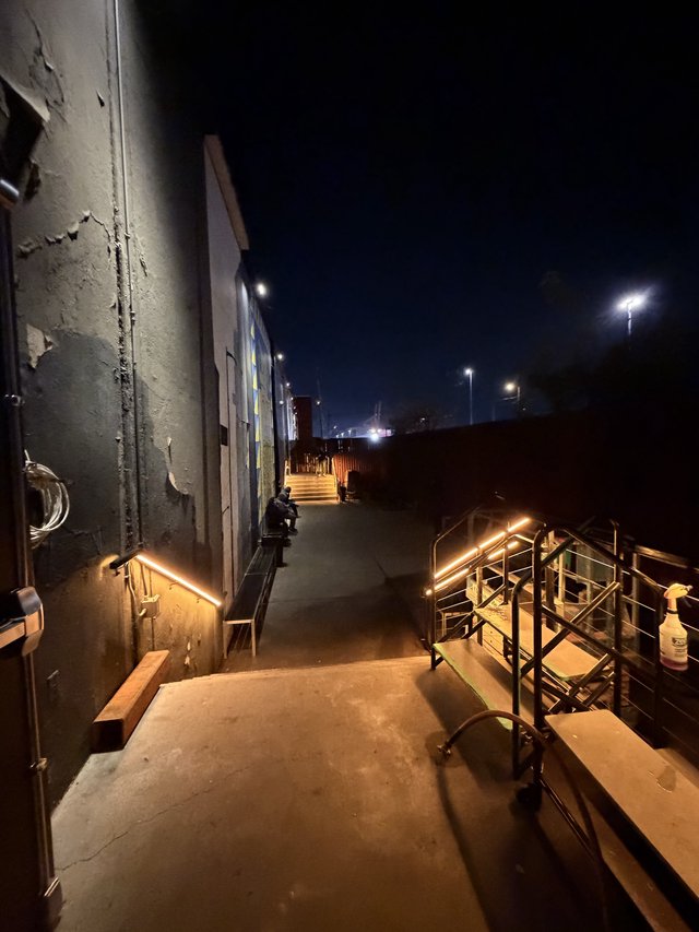 Illuminated Industrial Walkway at Dawn