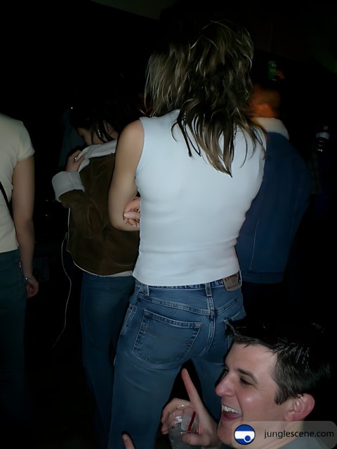 White Shirt and Jeans in a Nightclub Crowd