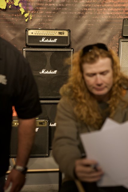 Dave Mustaine with a Redhead by his Side