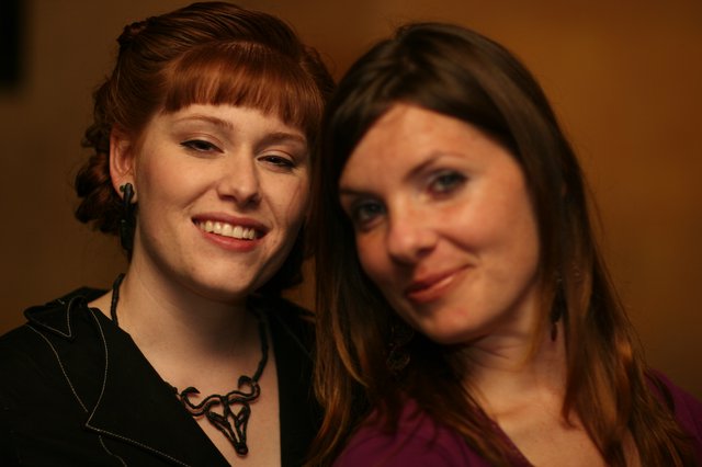 Two Friends Share a Warm Smile Together