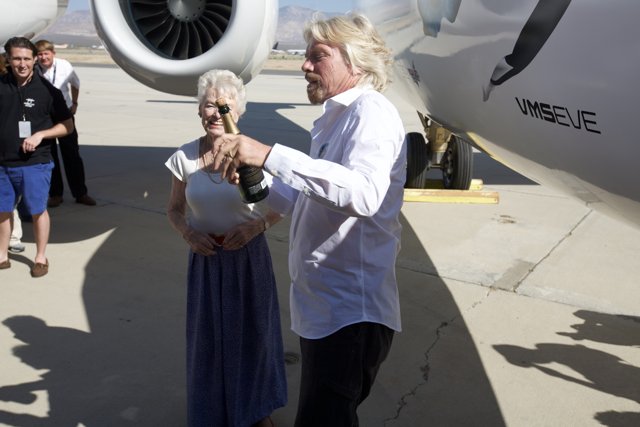 Richard Branson Toasts to Flight Success