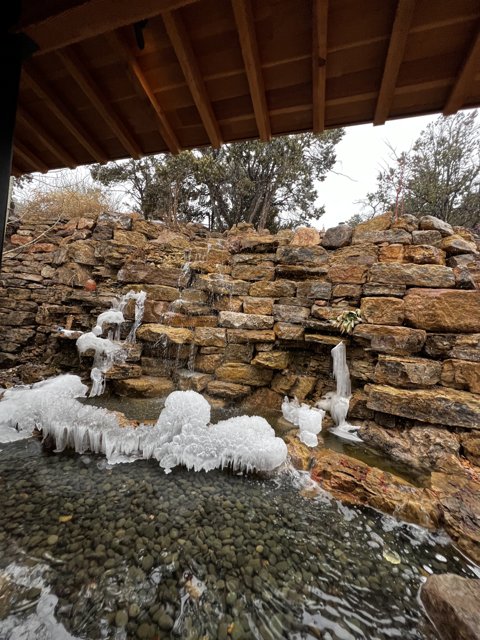 The Frozen Waterfall in the Stone Wall of Santa Fe
