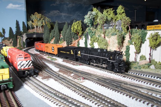 Model Train Chugging Through a Scenic Diorama