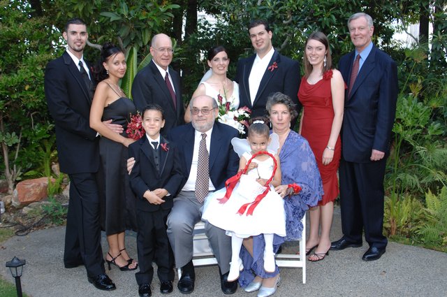Family Wedding Portrait in Lush Garden Setting