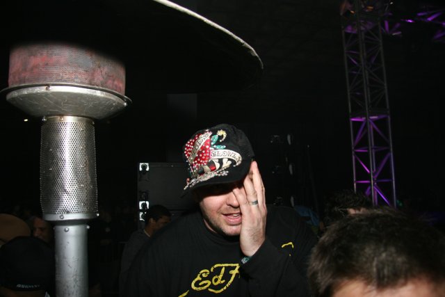 Hat-wearing Mitch Larkin in a NYC club
