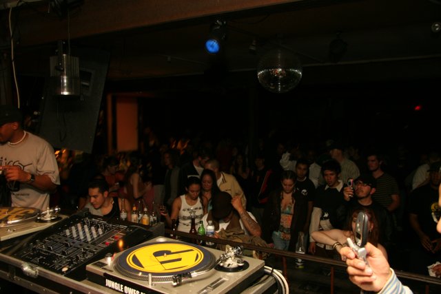 DJ spinning tunes at a lively nightclub