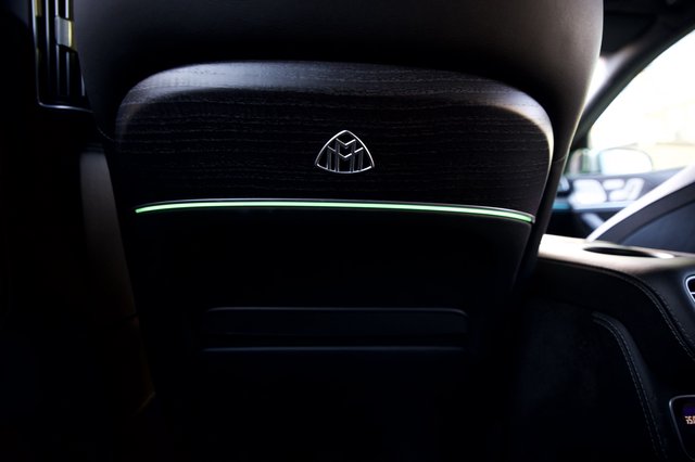 Luxury Car Interior Detail with Maybach Emblem