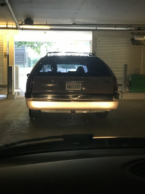 Parked Car in Well-Lit Garage