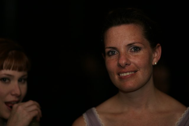 Candid Portrait of Smiling Woman at Evening Event