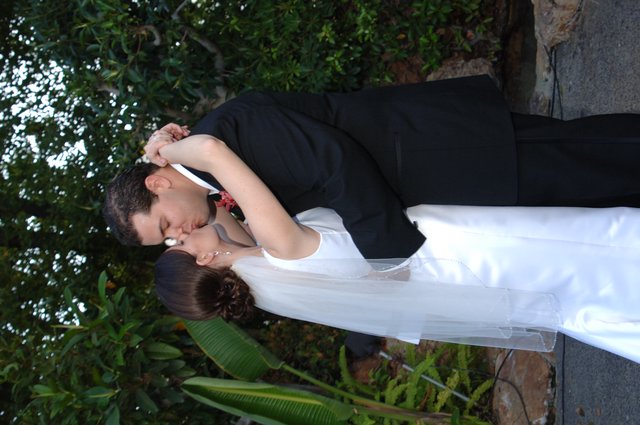 Bride and Groom Share First Kiss at Wedding