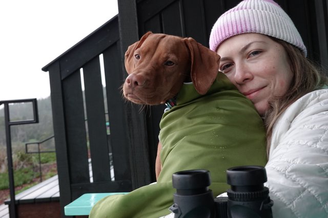 Woman and Dog's Cozy Outdoor Moment Together
