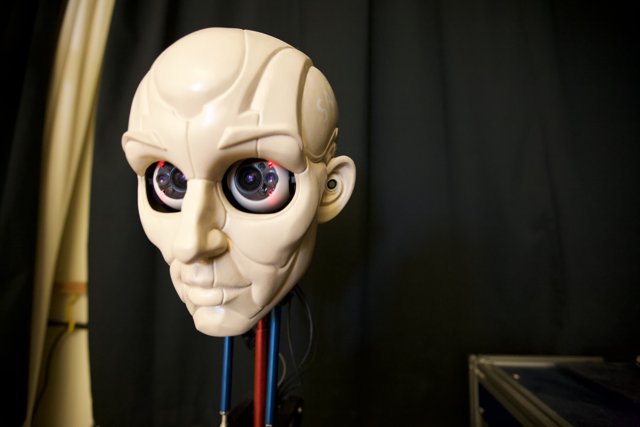 Robot Head Figurine with Alien-Like Features