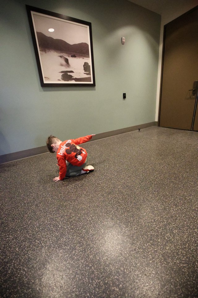 Young Boy Reaching in Empty Hallway at Skywalker Ranch