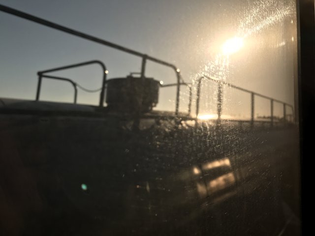 Sunlight Streams Through Train Window