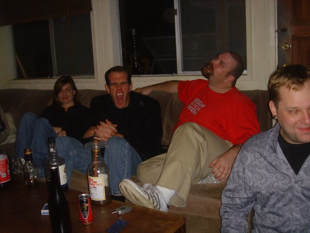 Friends Laughing Together at a House Party