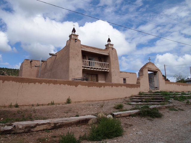 The Stunning Adobe Building with a Bell Tower