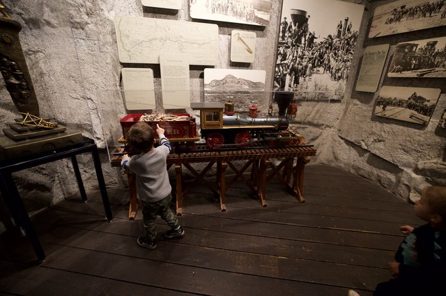 Young Child Discovers Historic Train Model at Museum