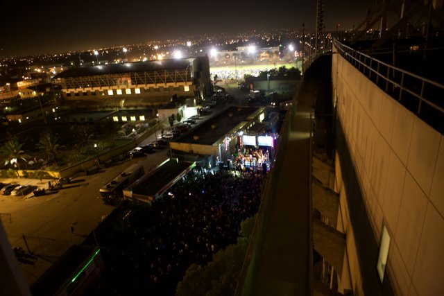 Nighttime Gathering on Metropolis Rooftop