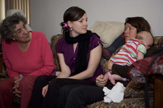 Three Generations of Women Share a Quiet Moment