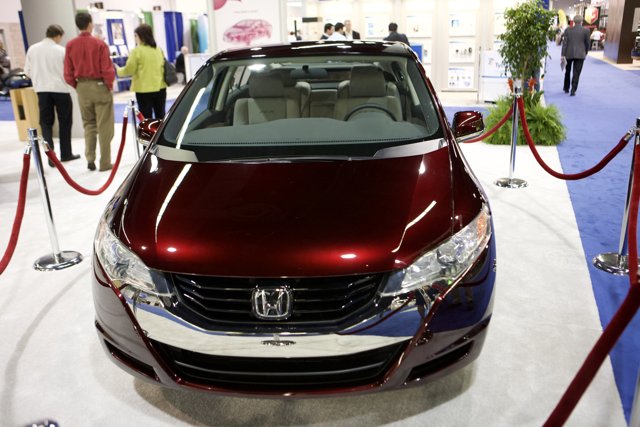 Red Honda Sports Car Shines at Car Show