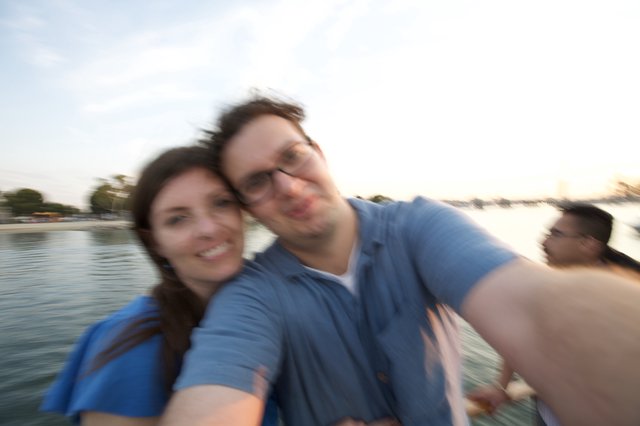 Blurry Couple Selfie by the Water at Dusk