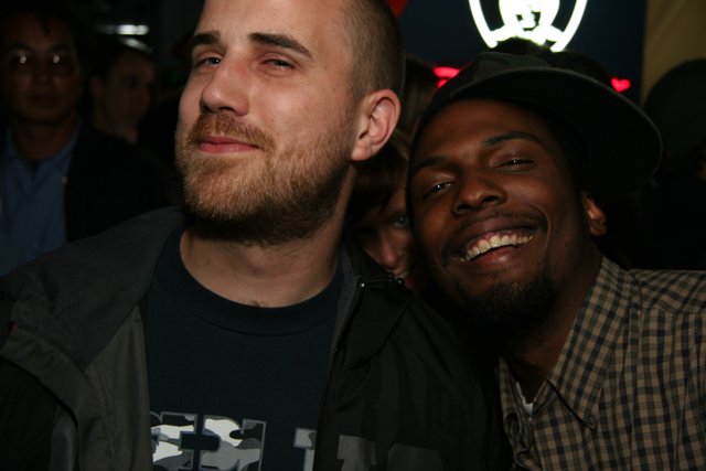 Two Happy Men in Baseball Caps