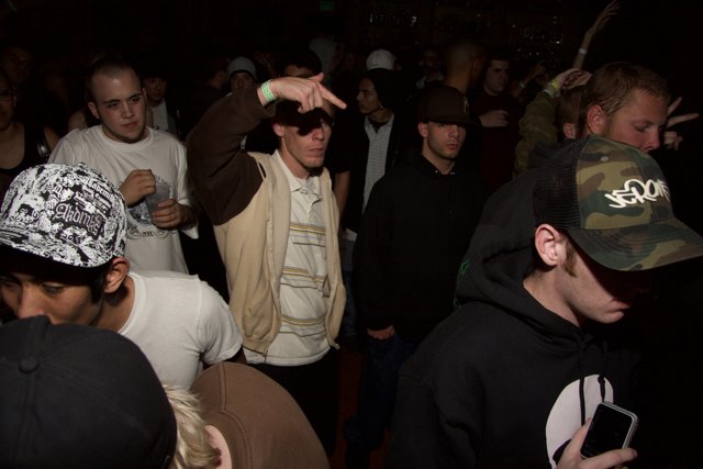Party Goers in Baseball Caps