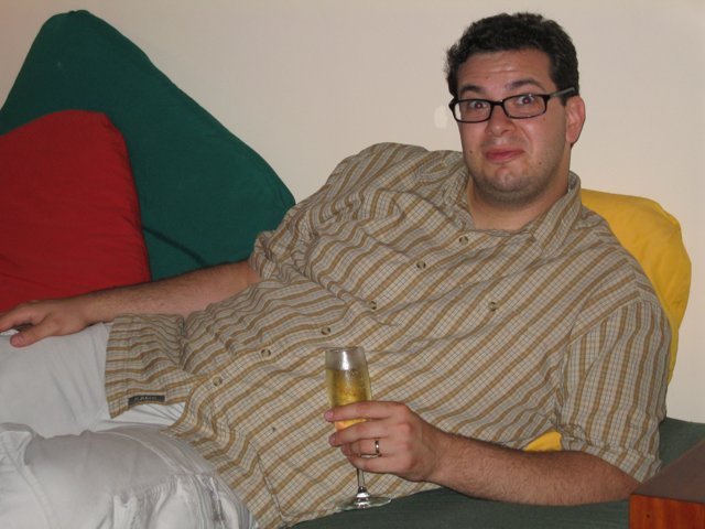 Man Enjoying a Cold One on the Couch