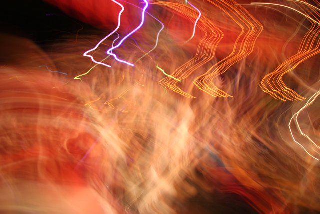 Blurry Figure in a Fiery Neon Dream