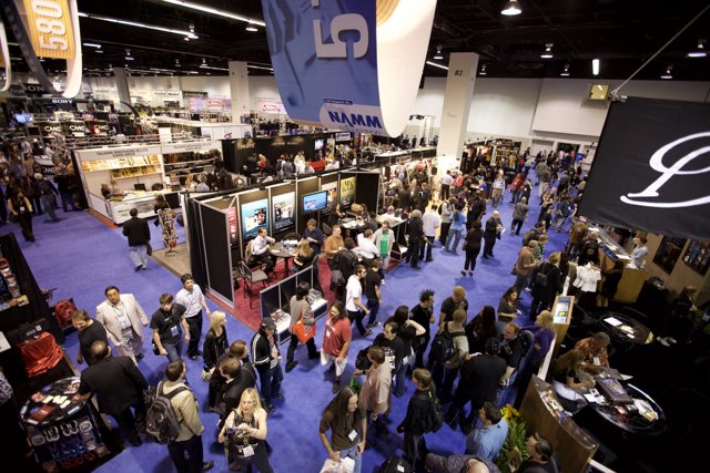 Virgil Donati Surrounded by Enthusiastic Crowd at NAMM Trade Show