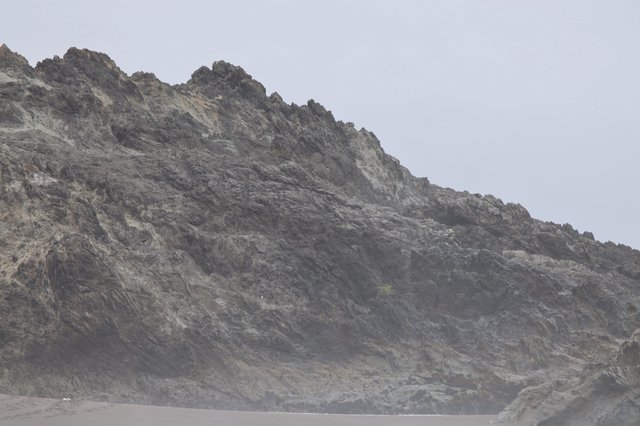 Jagged Coastal Cliffs Shrouded in Ocean Mist