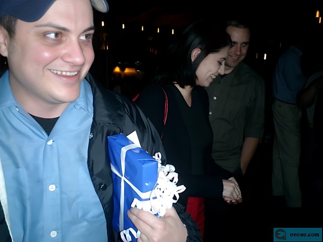 Alan W with a Blue Gift Bag