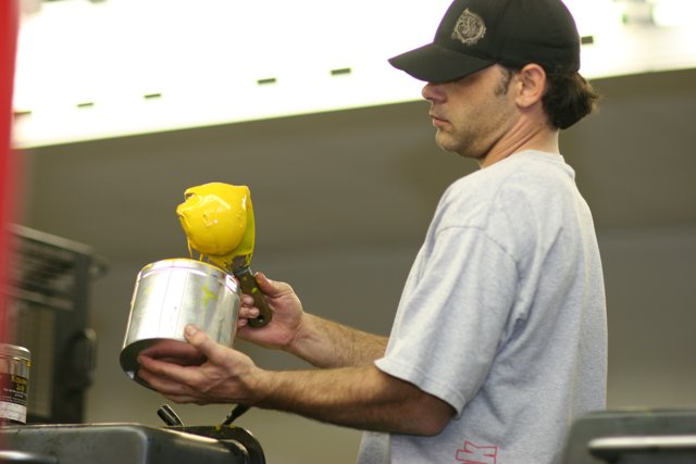 Painting a Can with a Baseball Cap