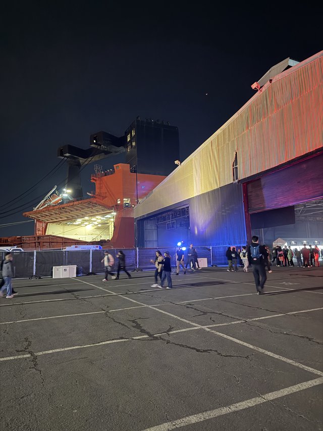 Industrial Warehouse Event at Night with Colorful Lighting