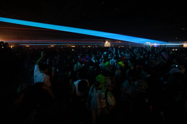 Laser Light Show Illuminates Massive Festival Crowd