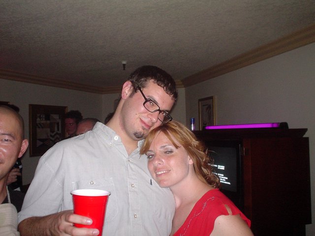 Dave and Penelope Posing Together at House Party
