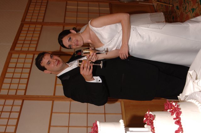 Bride and Groom Toast with Champagne at Wedding Reception