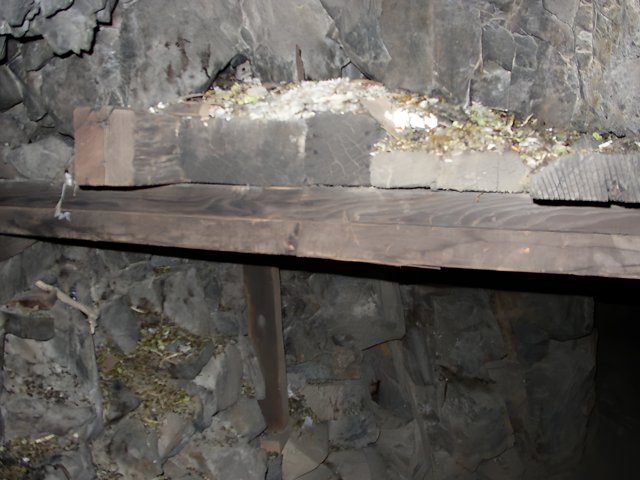Wooden bench in the slate cave