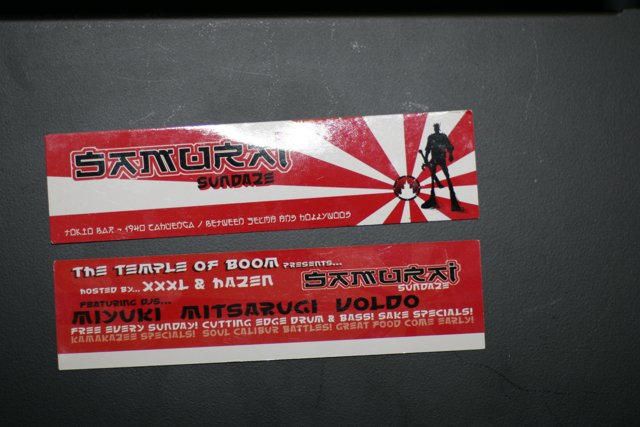 Red and Black Sticker Advertisement